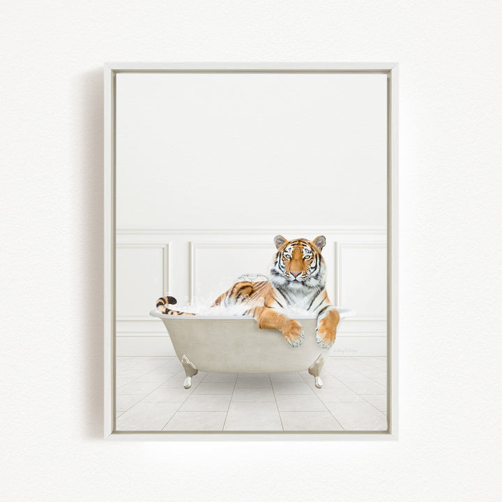 A tiger is sitting in a white bathtub, appearing relaxed and comfortable.