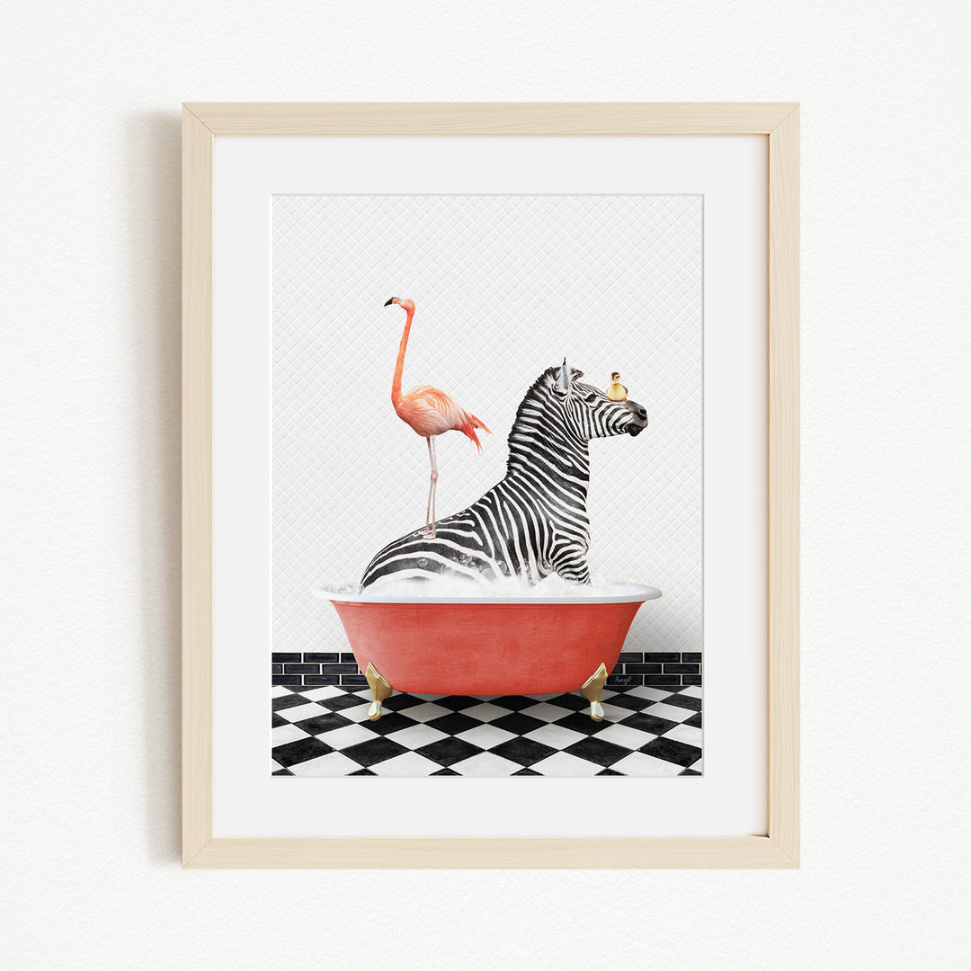 A framed image depicting a zebra sitting in a red bathtub, with a flamingo standing on its back and a bird perched on its head.