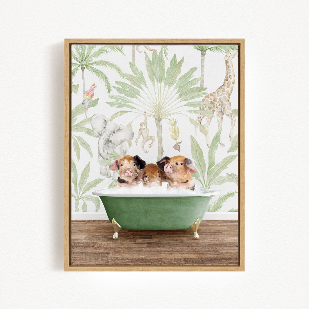 A framed print depicting three pigs sitting in a green bathtub, surrounded by a tropical jungle wallpaper with various animals and plants.