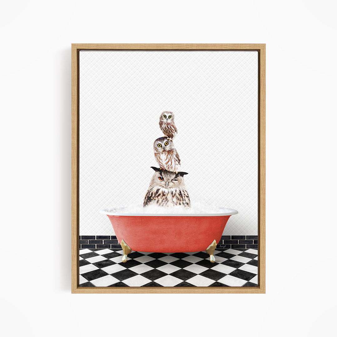 A framed image depicting a group of owls sitting in a red bathtub on a black and white checkered floor.
