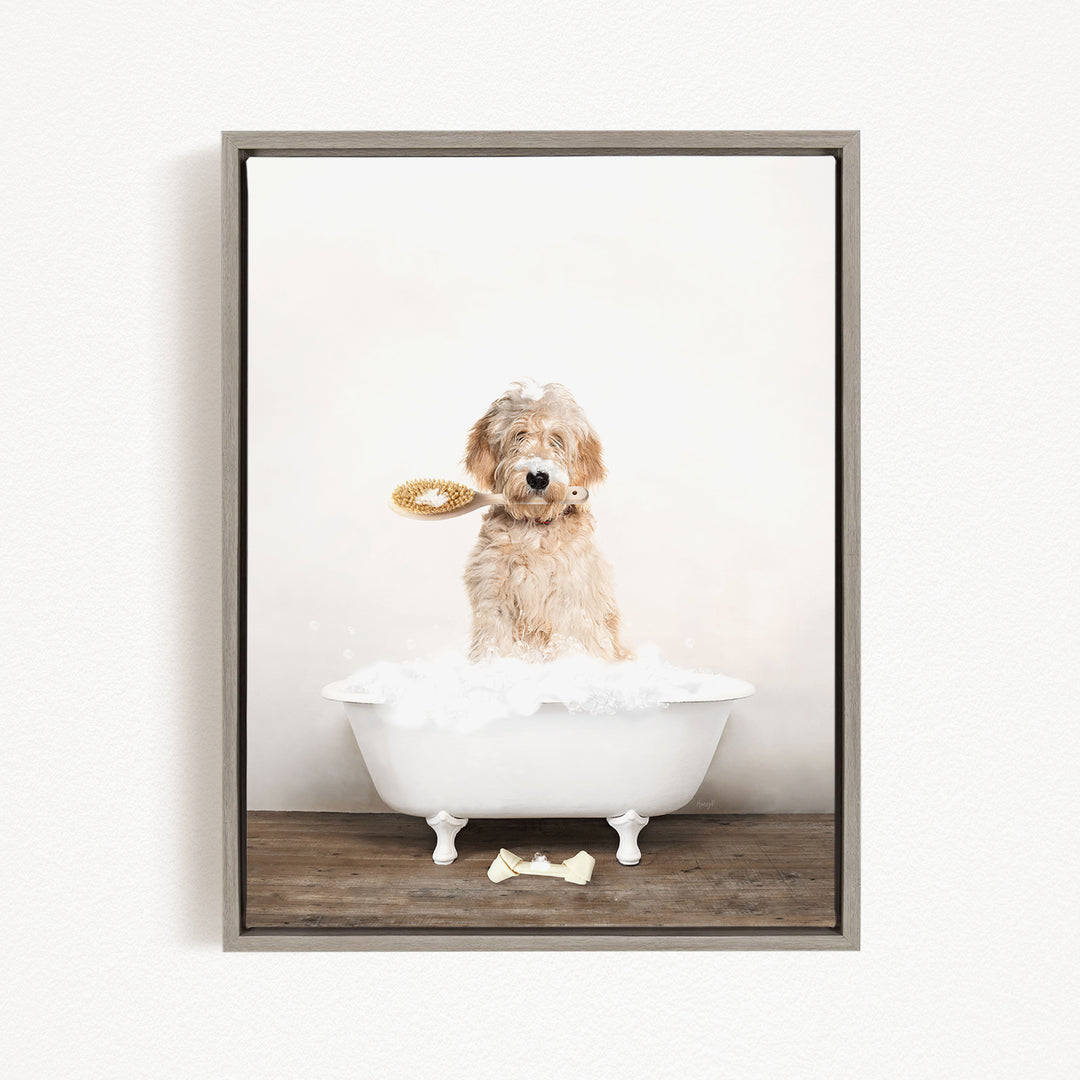 A fluffy dog sitting in a white bathtub, holding a yellow toy in its mouth.