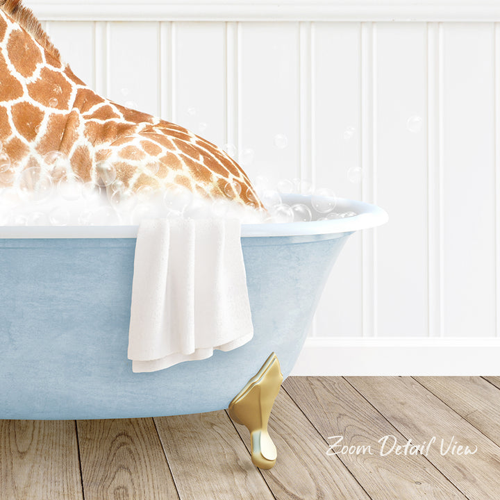 A giraffe is sitting in a blue bathtub filled with water, with a white towel hanging on the side and a gold bathtub leg visible.