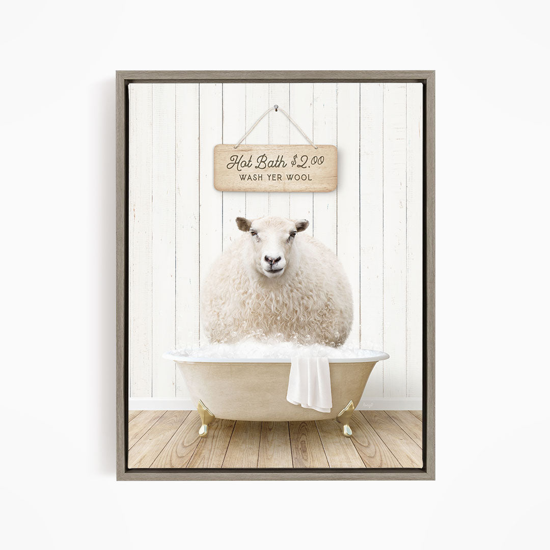 A fluffy white sheep sits in a bathtub, with a sign above it that reads "Hot Bath $2.00 WASH YOUR WOOL".