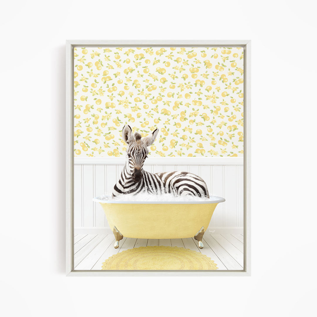A zebra is sitting in a yellow bathtub, surrounded by a yellow and white floral patterned wall.