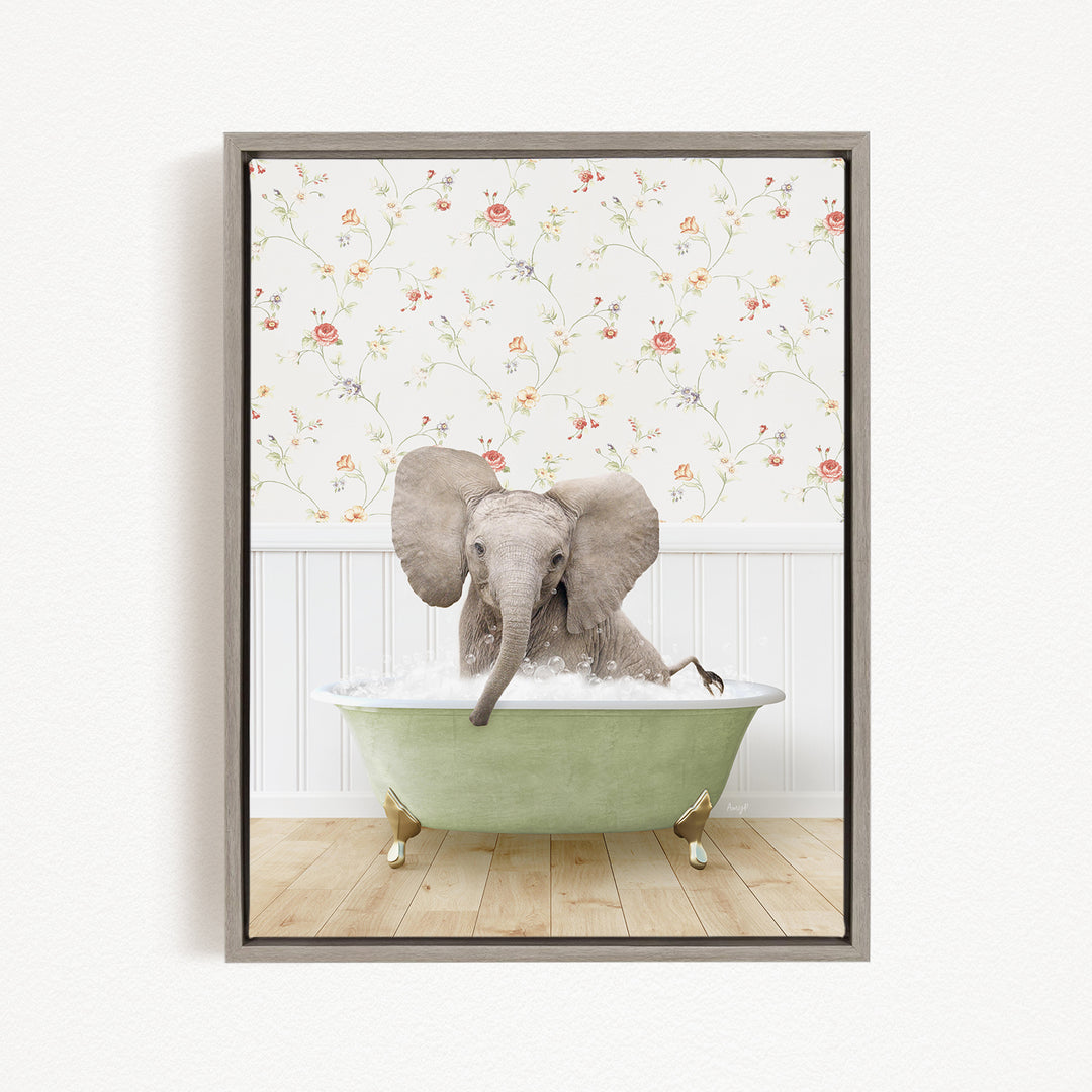 A gray elephant is sitting in a green bathtub, surrounded by a floral wallpaper.