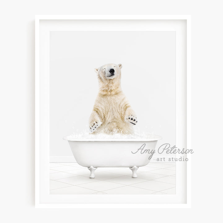 a polar bear sitting in a bath tub