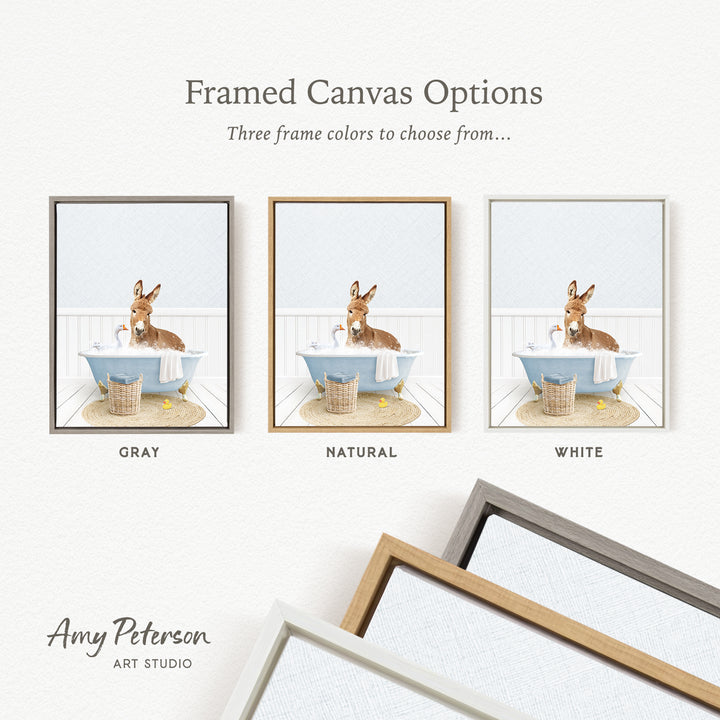 The image is a framed canvas option showcasing three different colored frames with a picture of a rabbit sitting in a bathtub.