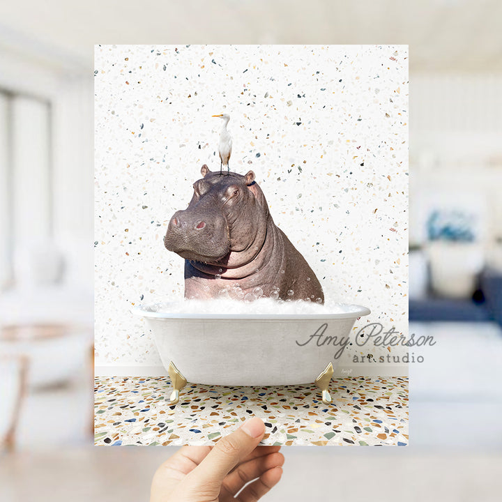 a hippopotamus in a bathtub with confetti all over it