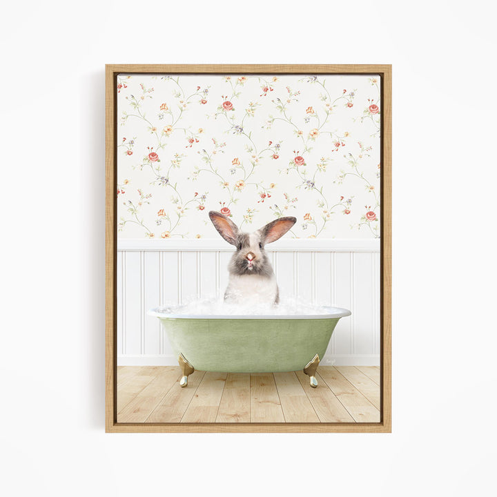 A cute rabbit sitting in a green bathtub filled with water, surrounded by a floral wallpaper.