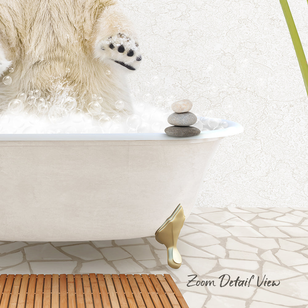 A polar bear is standing in a bathtub filled with bubbles, with a stack of rocks on the edge of the tub.