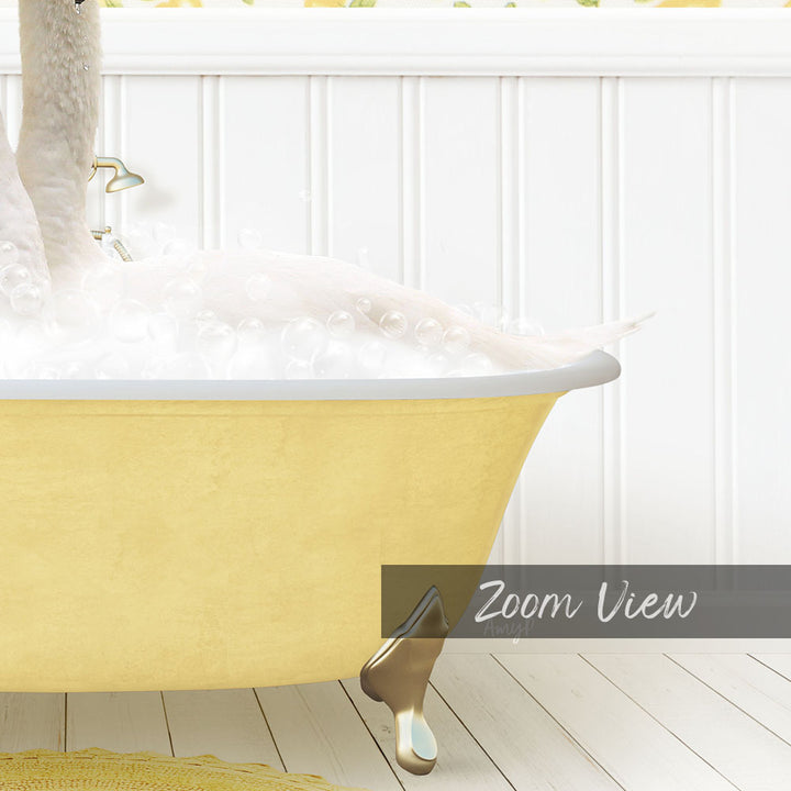 A yellow claw-foot bathtub filled with bubbles, with a white wall and a yellow rug in the background.