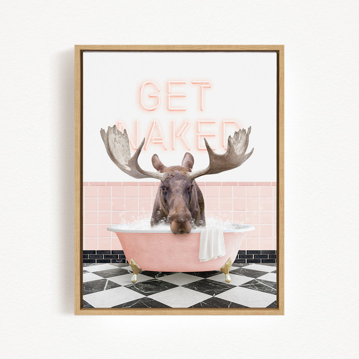 A framed image depicting a moose sitting in a pink bathtub with the text "GET NAKED" displayed above it.