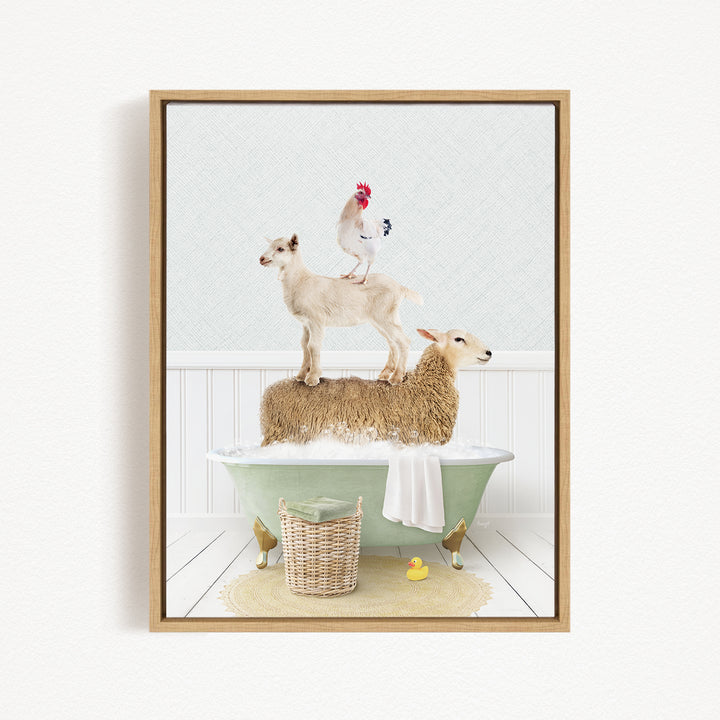 A framed image depicting a sheep standing on a goat's back while a rooster stands on top of the goat, all in a bathtub.