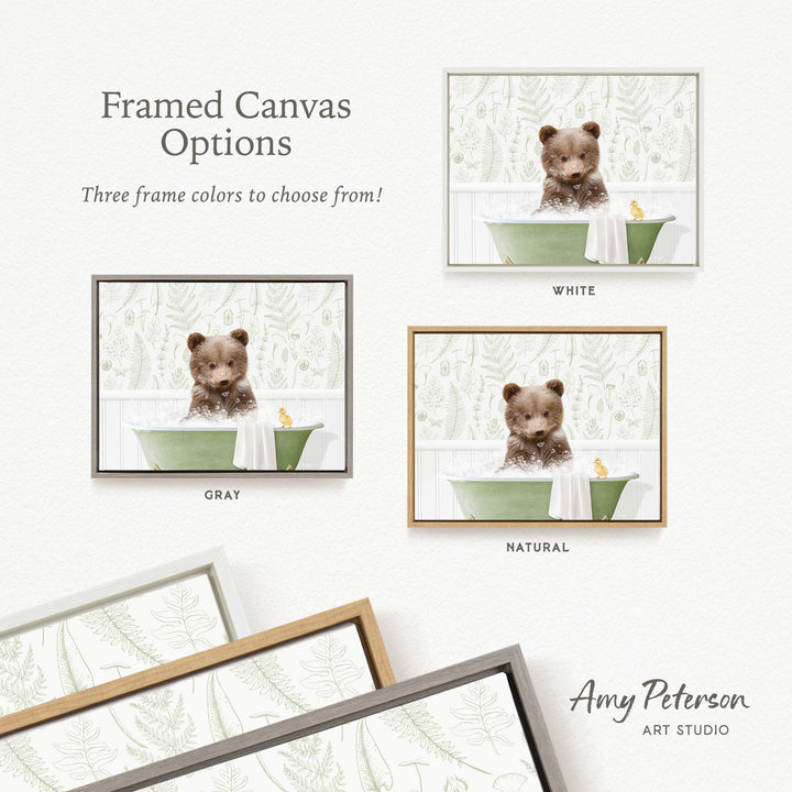 three framed canvas options featuring a brown bear sitting in a green bathtub, with a yellow bird nearby. The options include a white frame, a gray frame, and a natural frame.