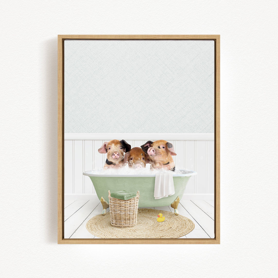 Three adorable pigs sitting in a green bathtub, surrounded by a basket of toys and a yellow rubber duck.