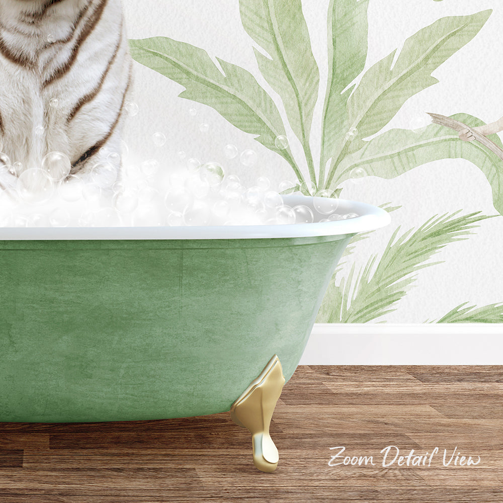 A white tiger is sitting in a green bathtub filled with bubbles, with a tropical plant wallpaper in the background.
