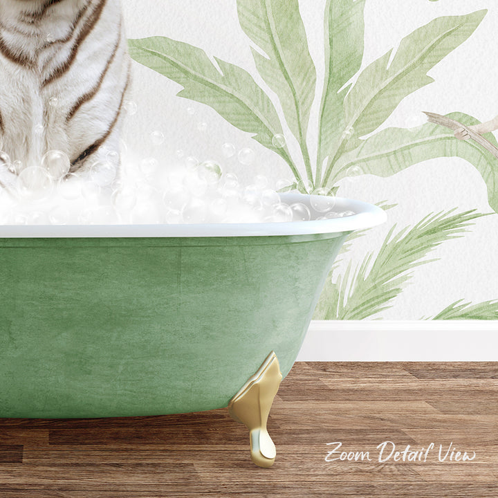 A white tiger is sitting in a green bathtub filled with bubbles, with a tropical plant wallpaper in the background.