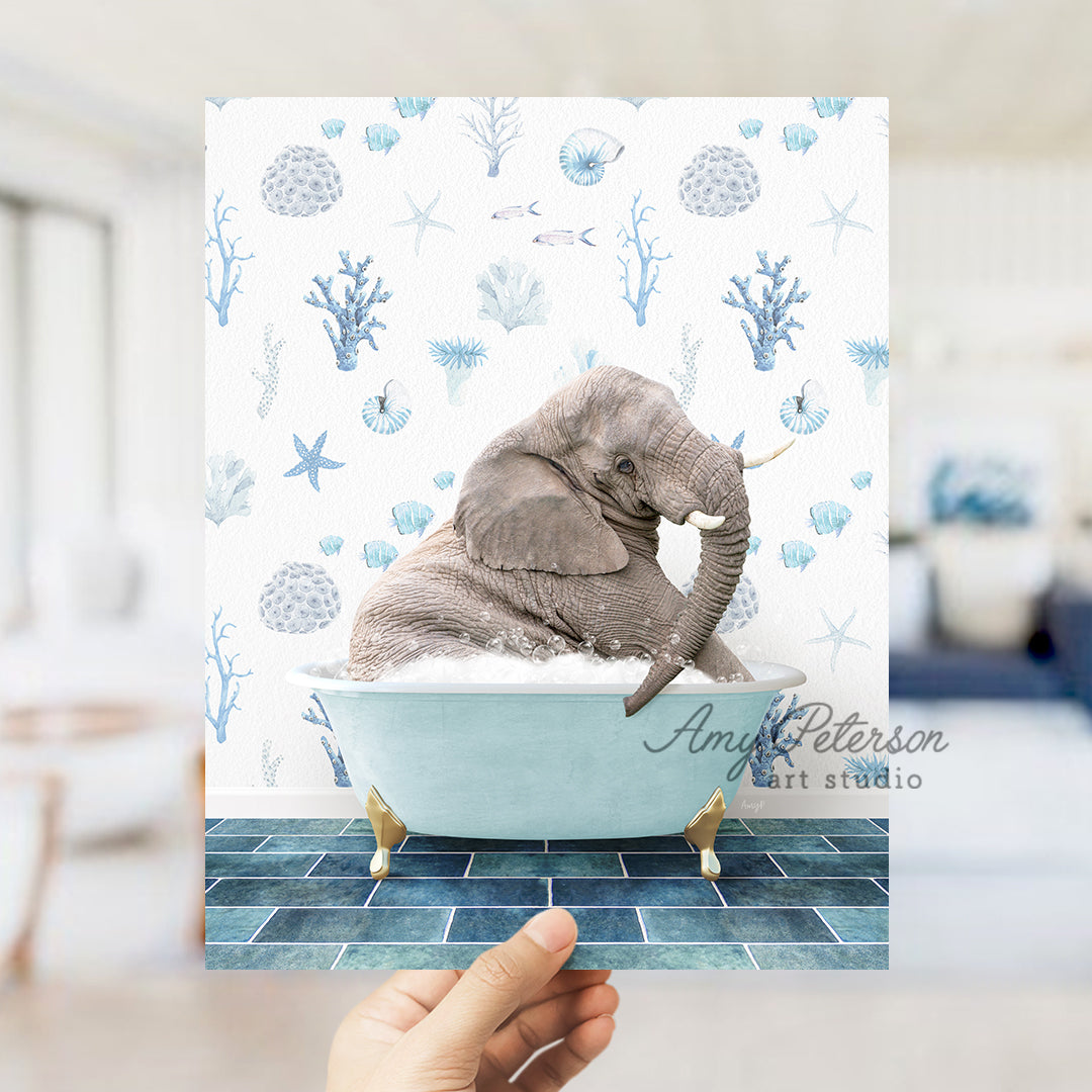 a person holding up a card with an elephant in a bathtub