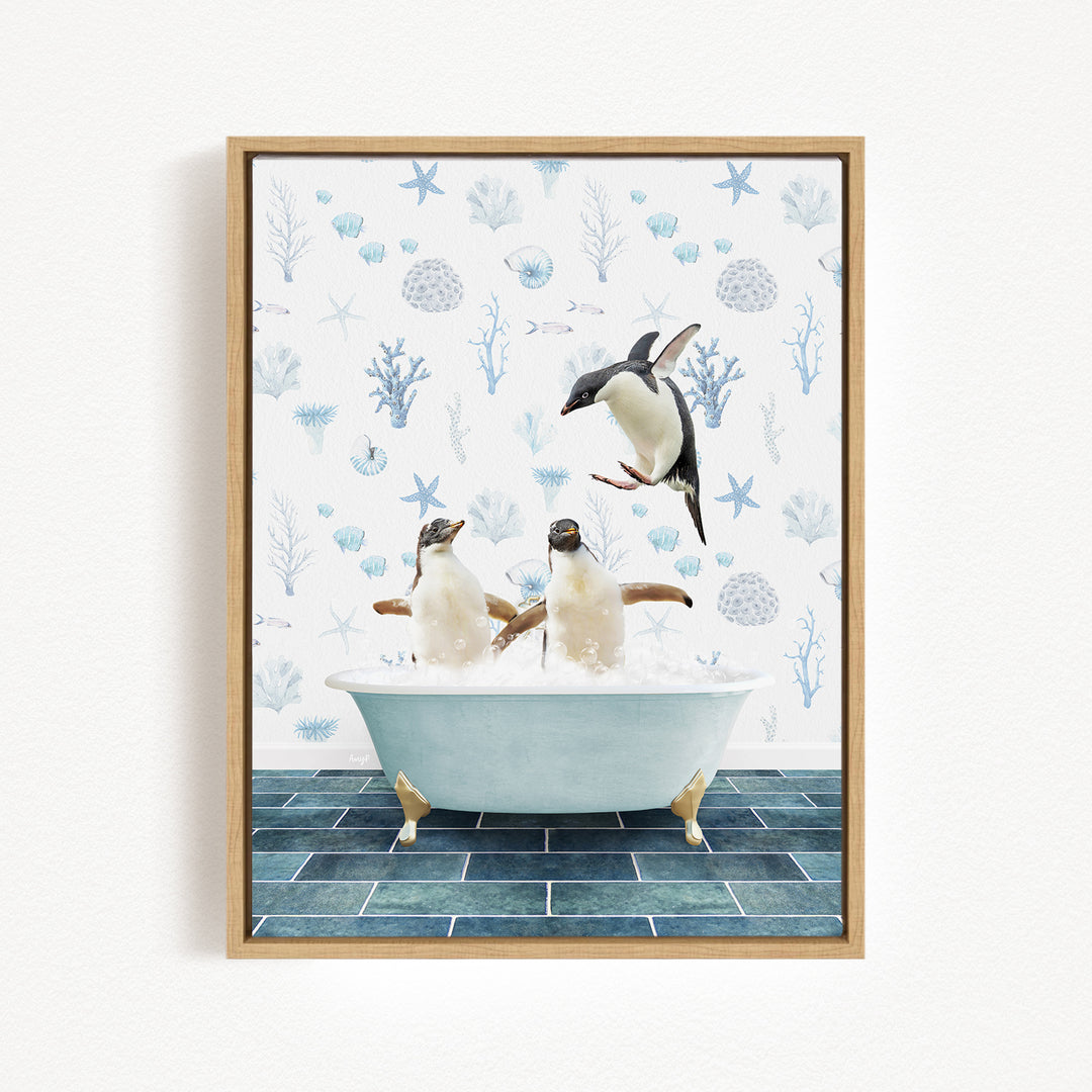 A framed image depicting two penguins sitting in a bathtub, with one penguin jumping out of the tub.