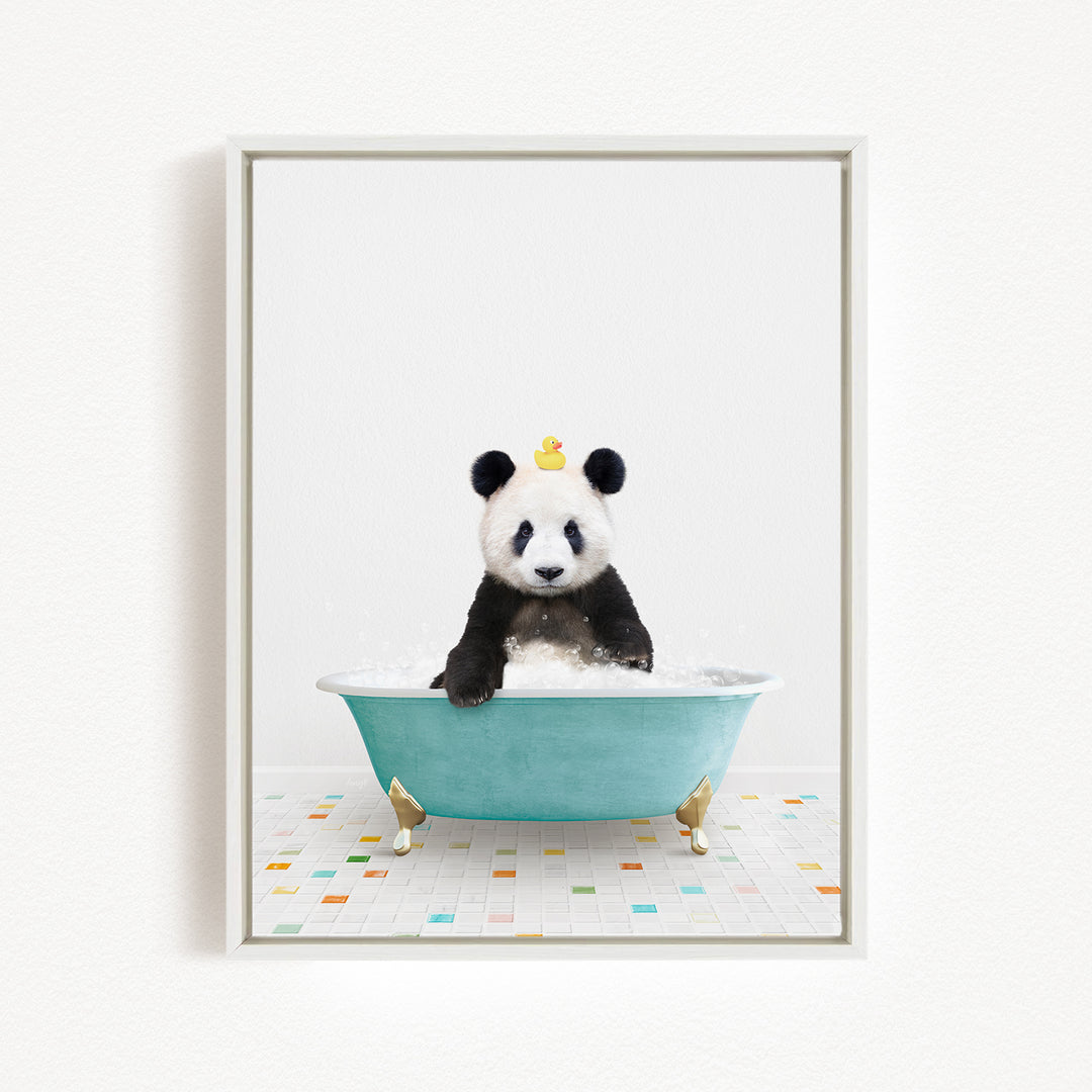 A panda bear sitting in a blue bathtub, with a yellow rubber duck floating on its head.