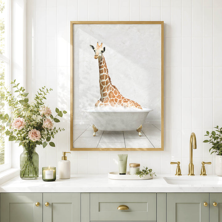 a bathroom with a framed picture of a giraffe sitting in a bathtub, surrounded by flowers and candles.