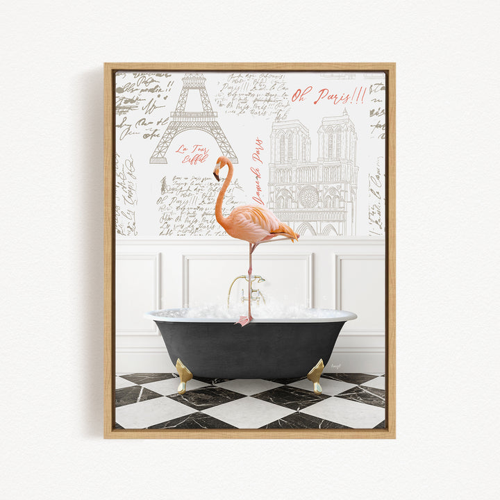 A pink flamingo stands on a black bathtub in a bathroom, with a framed picture of the Eiffel Tower and a black and white checkered floor in the background.