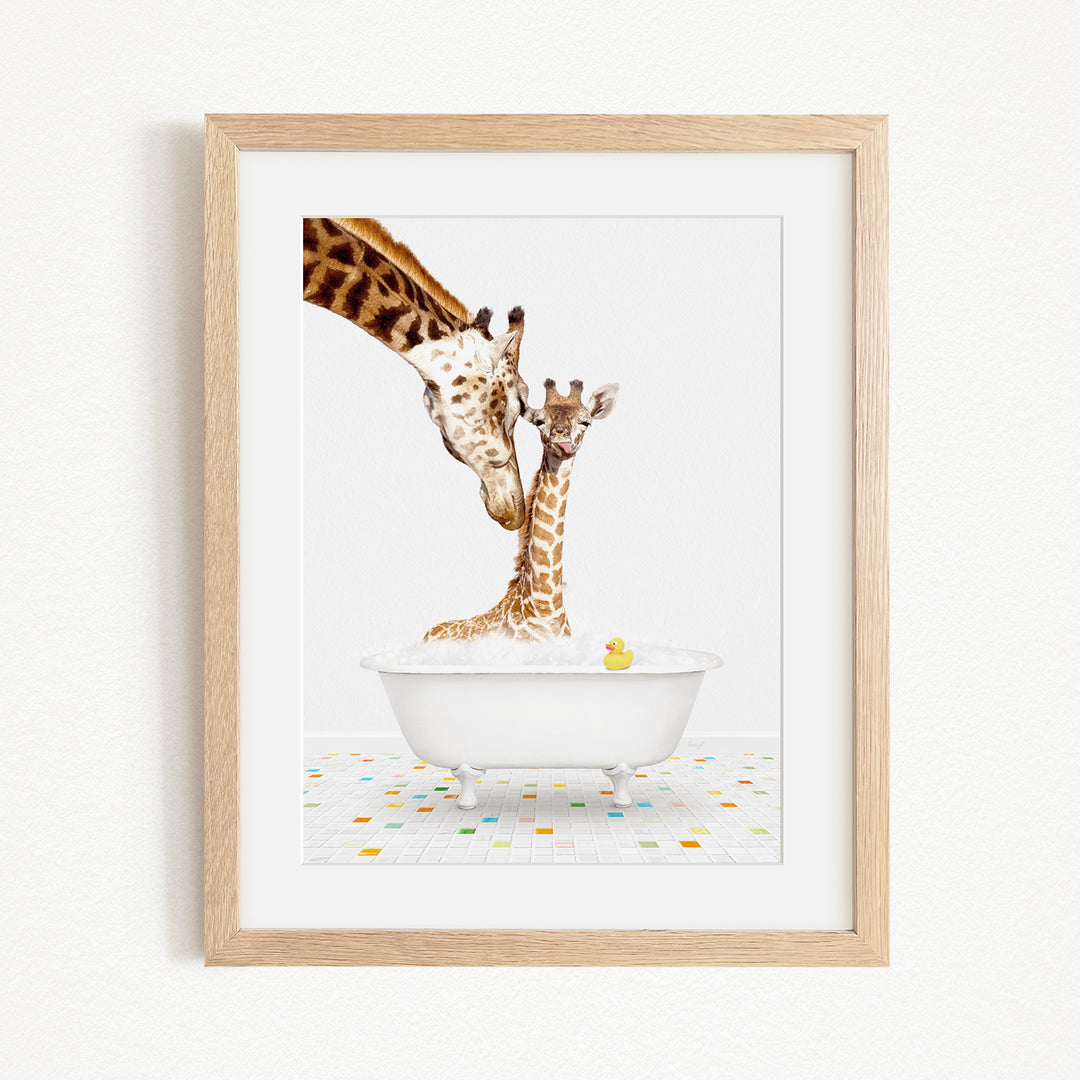 A mother giraffe and her baby giraffe are enjoying a bath together in a white bathtub, with a yellow rubber duck floating in the water.