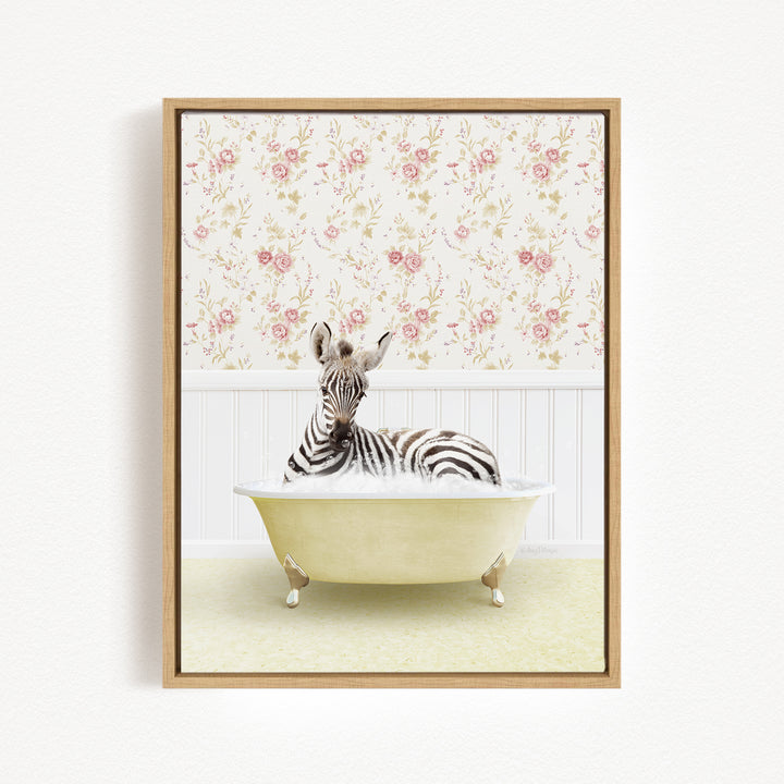 A zebra is sitting in a bathtub, surrounded by a floral wallpaper.