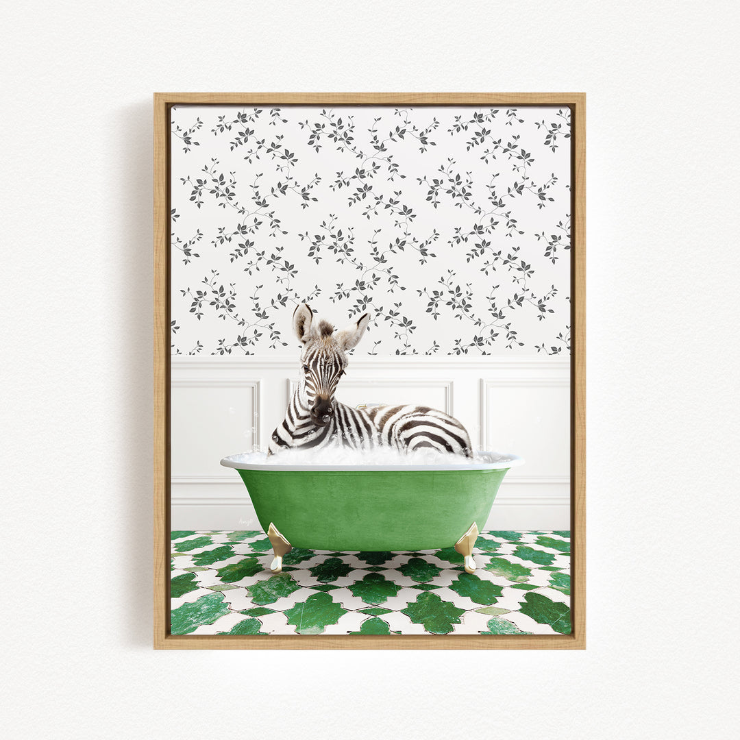 A zebra is sitting in a green bathtub, surrounded by a patterned wall and green and white floor tiles.