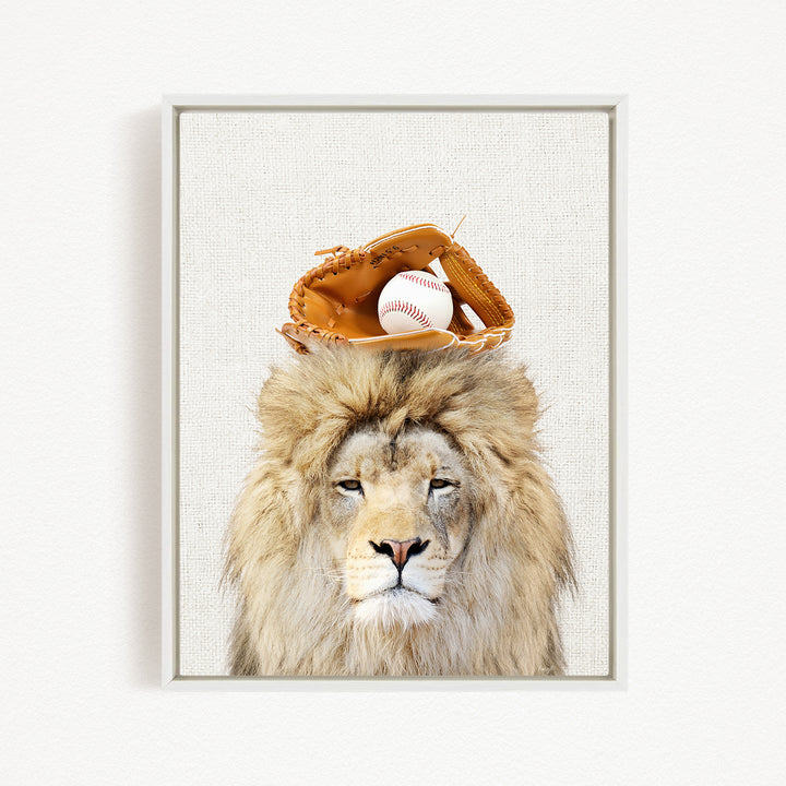 A lion wearing a baseball glove on its head, with a baseball resting on top of the glove.