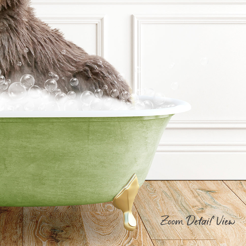 A close-up of a cat's paw submerged in a green bathtub filled with bubbles, with a wooden floor visible in the background.