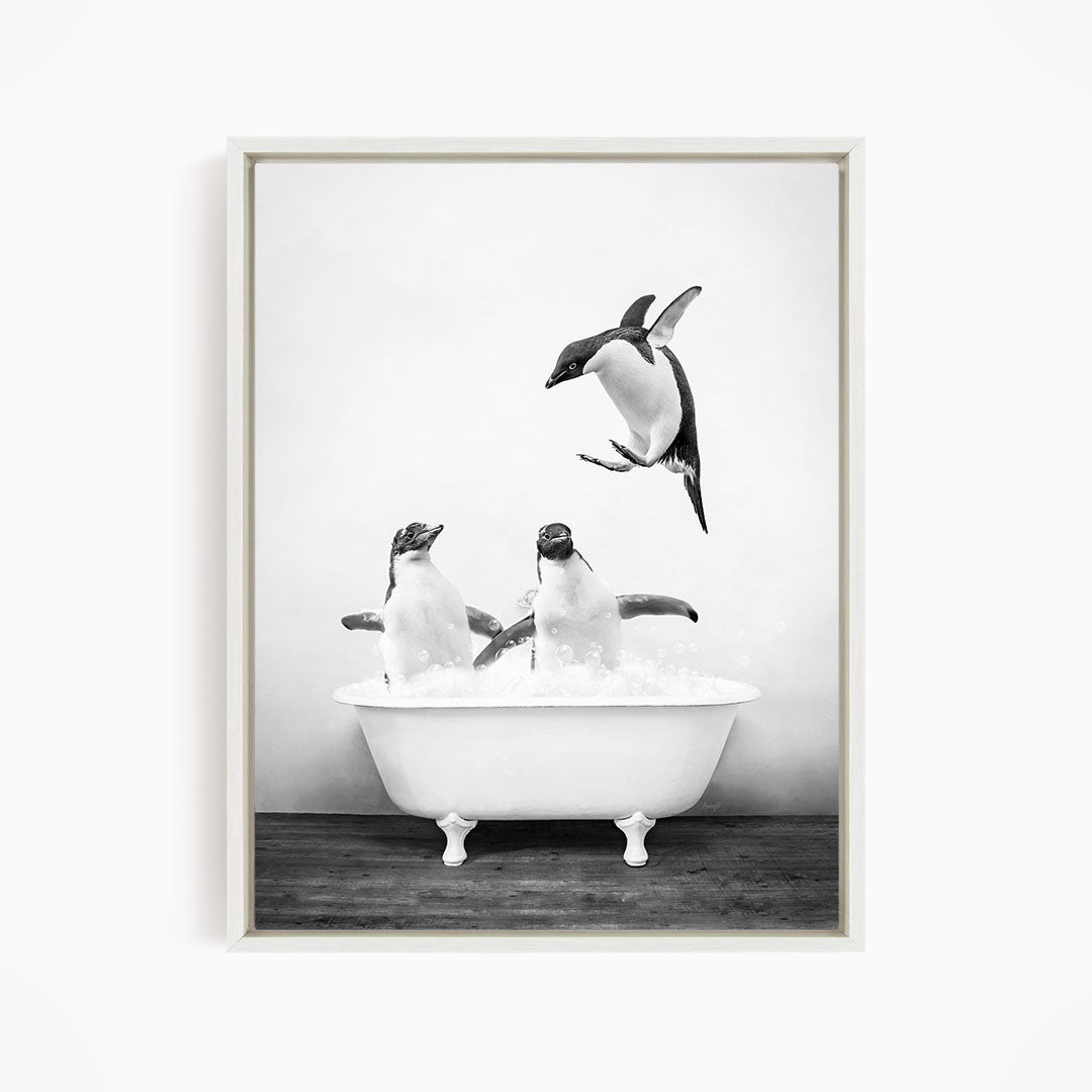 A black and white image of two penguins sitting in a bathtub, with one penguin flying towards the other.