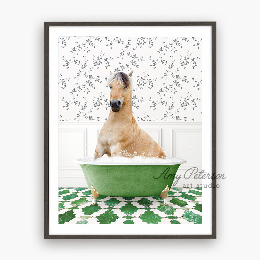 a horse is taking a bath in a green tub