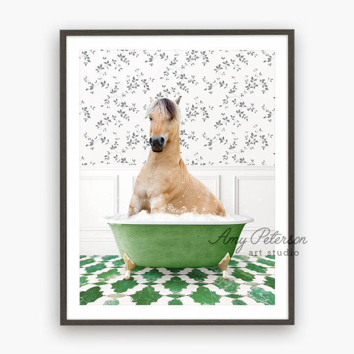 a horse is taking a bath in a green tub