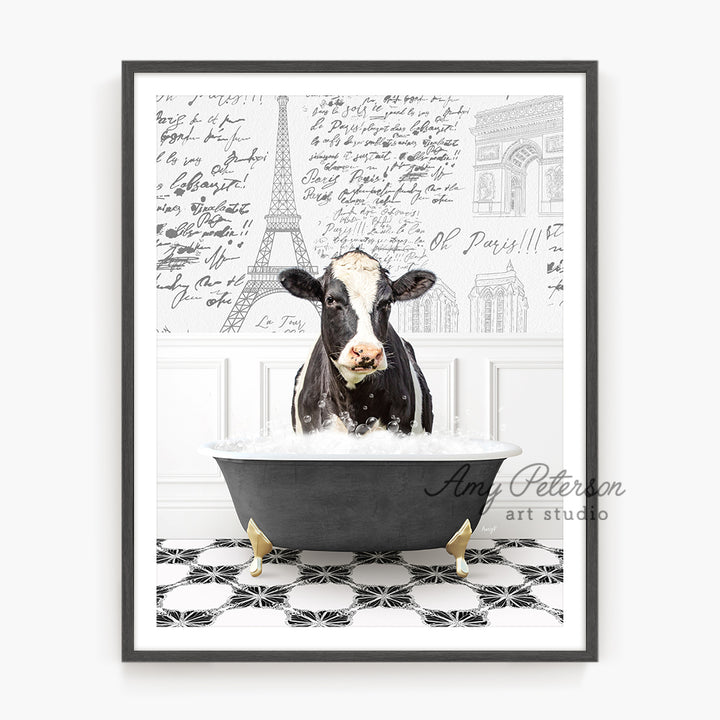 a black and white cow in a bathtub with the eiffel tower in