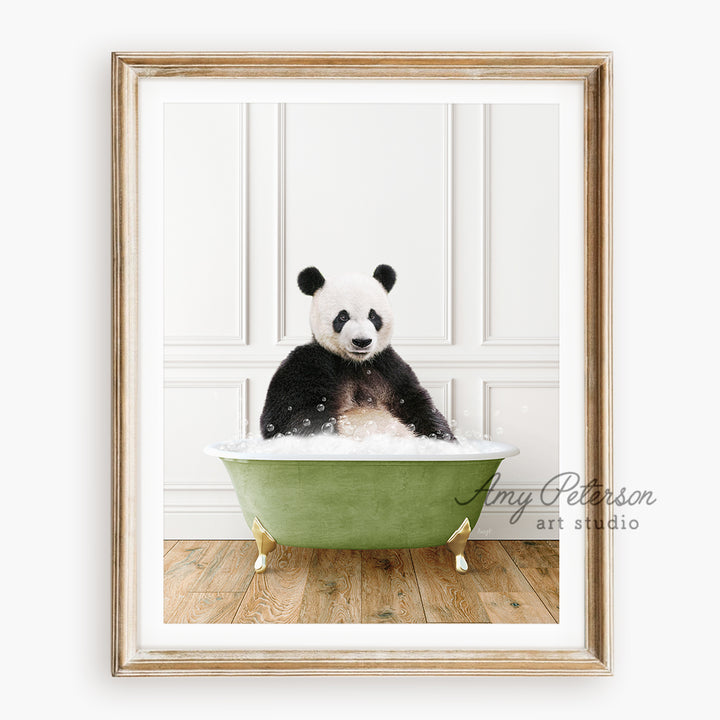 a panda bear sitting in a green bath tub