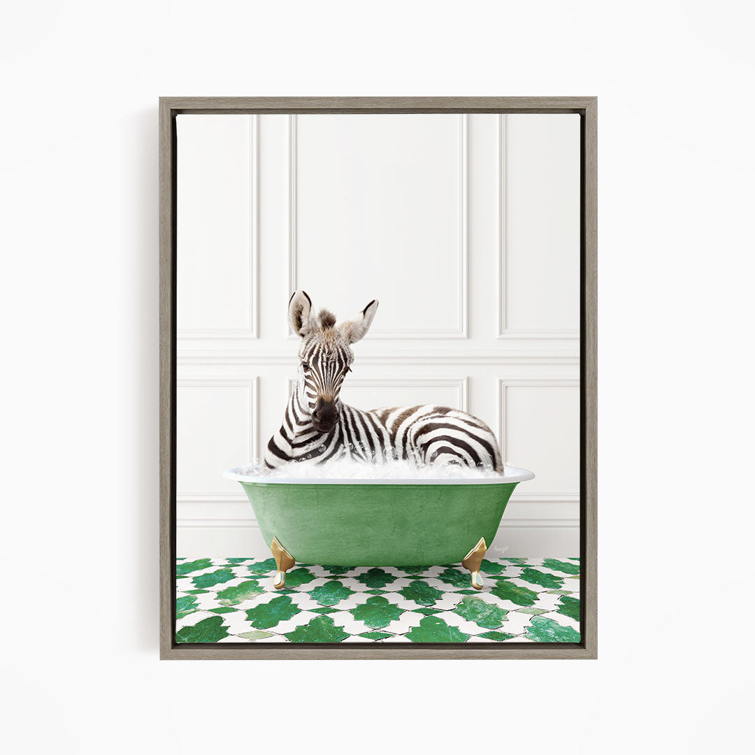 A zebra is sitting in a green bathtub, surrounded by a patterned floor.