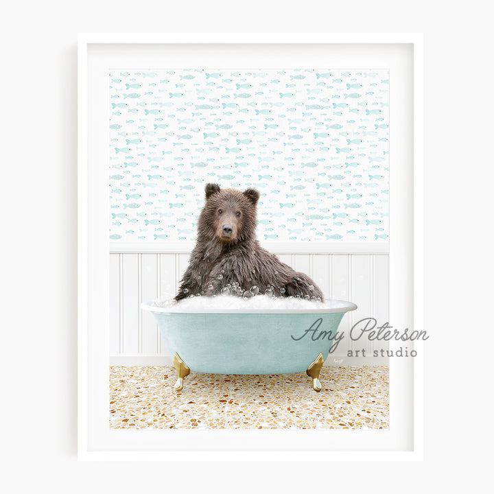 a brown bear sitting in a bath tub