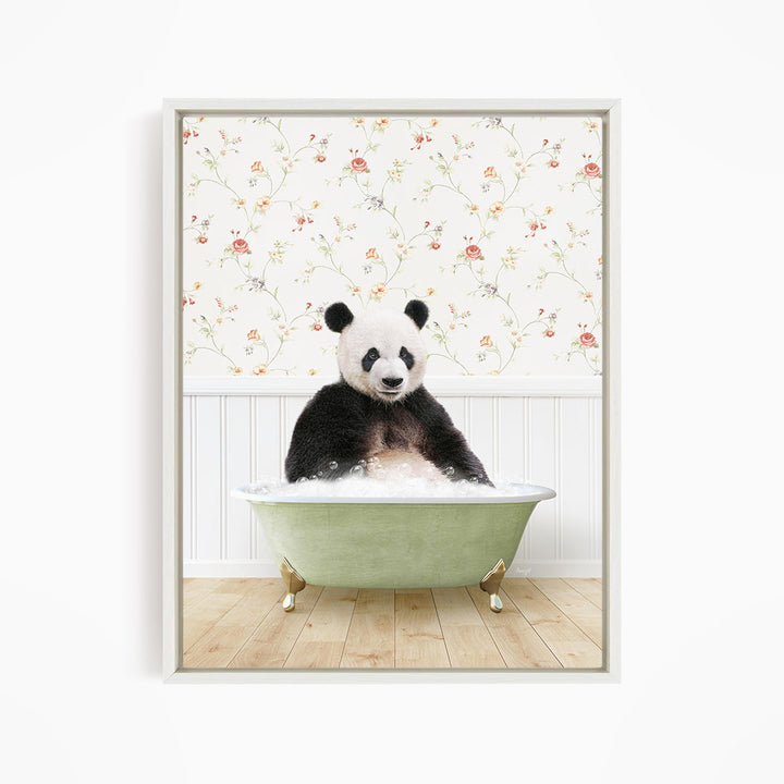 A panda bear sitting in a green bathtub filled with bubbles, surrounded by a floral wallpaper.