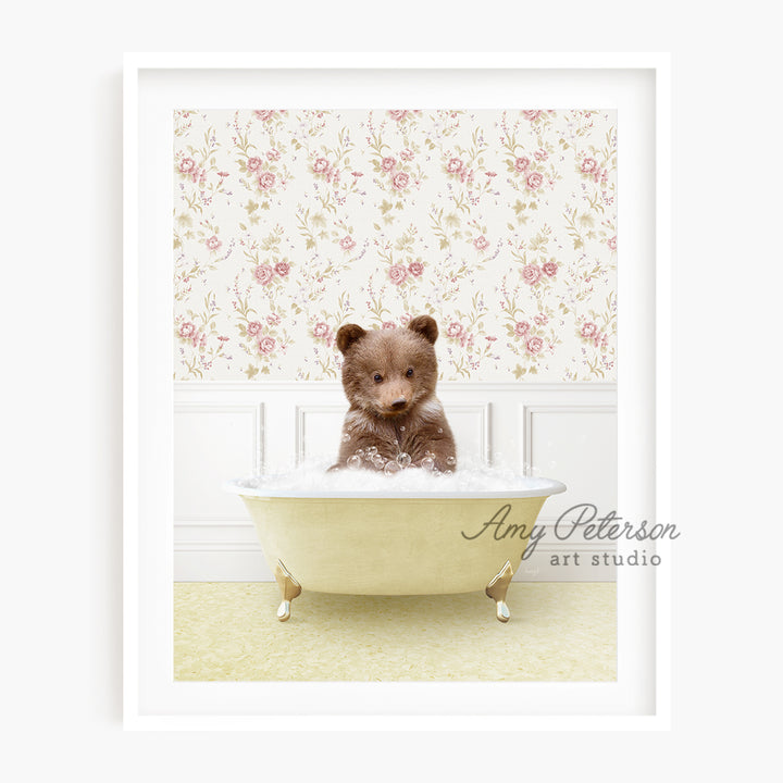 a brown teddy bear sitting in a bath tub