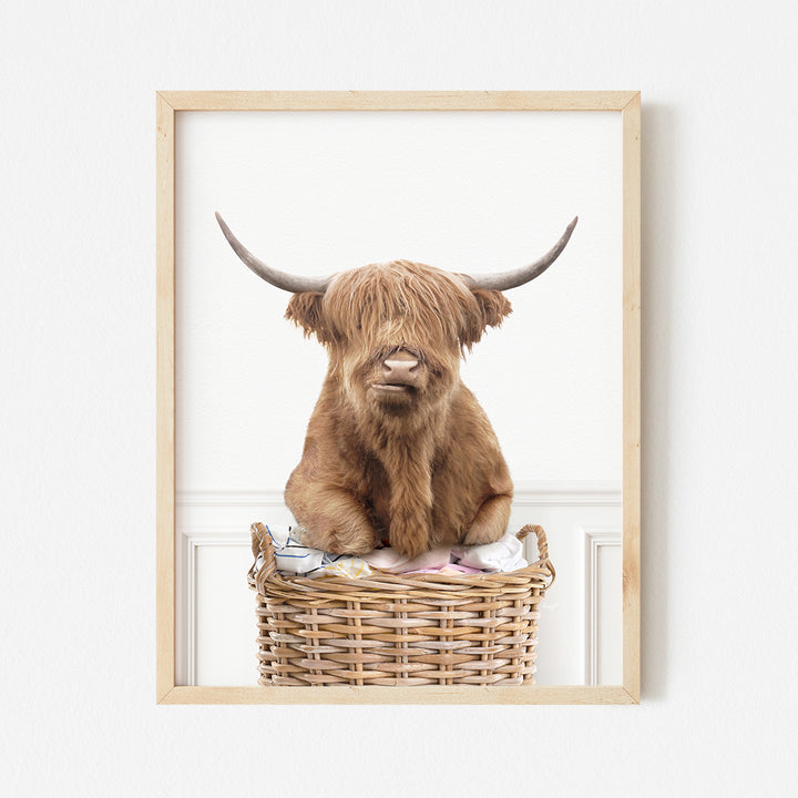 a picture of a brown cow sitting in a basket