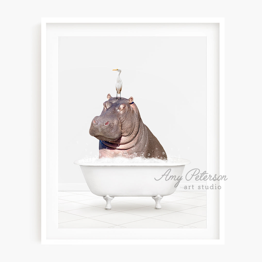 a hippo in a bathtub with a bird on top of it