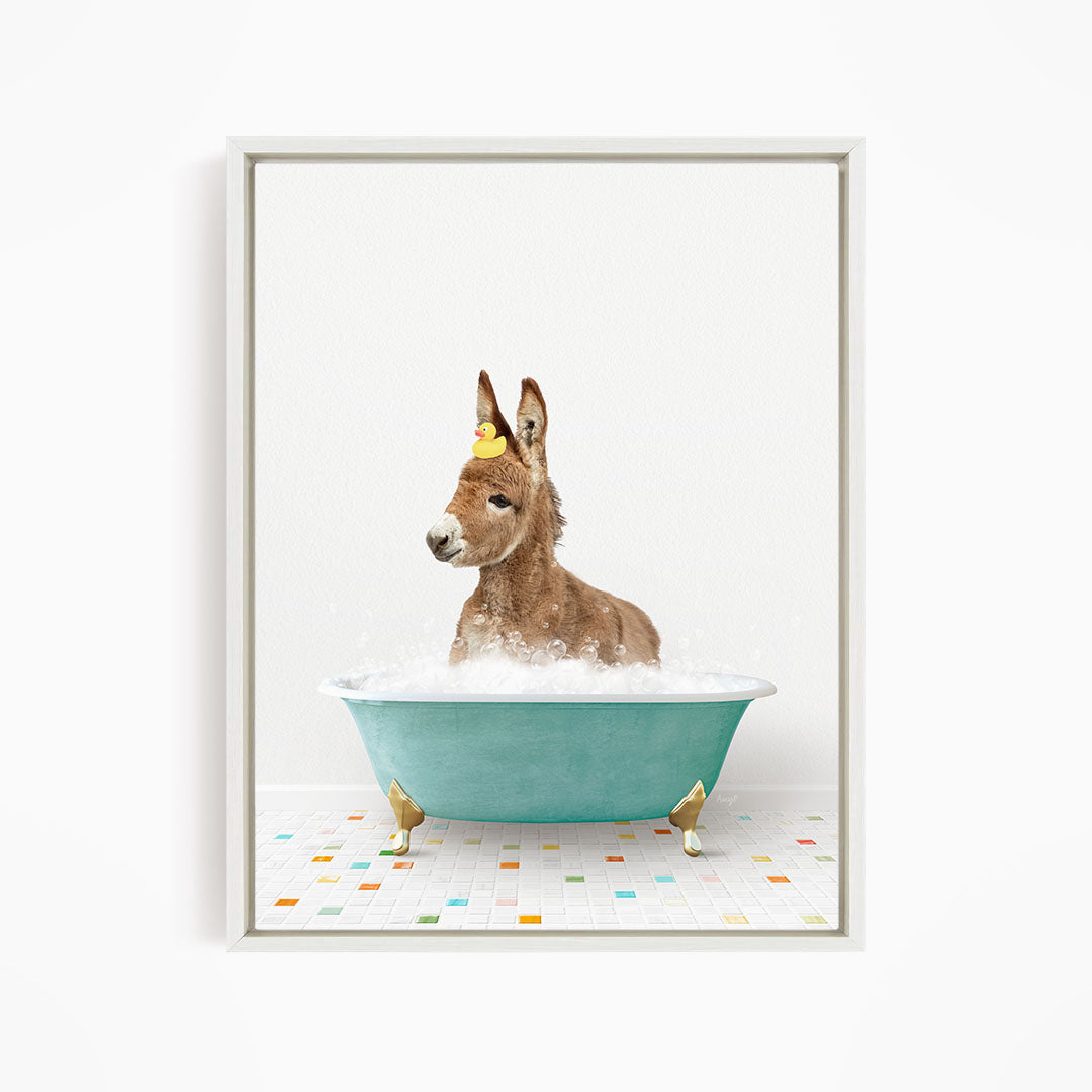 A donkey is sitting in a blue bathtub filled with water, surrounded by colorful tiles on the floor.