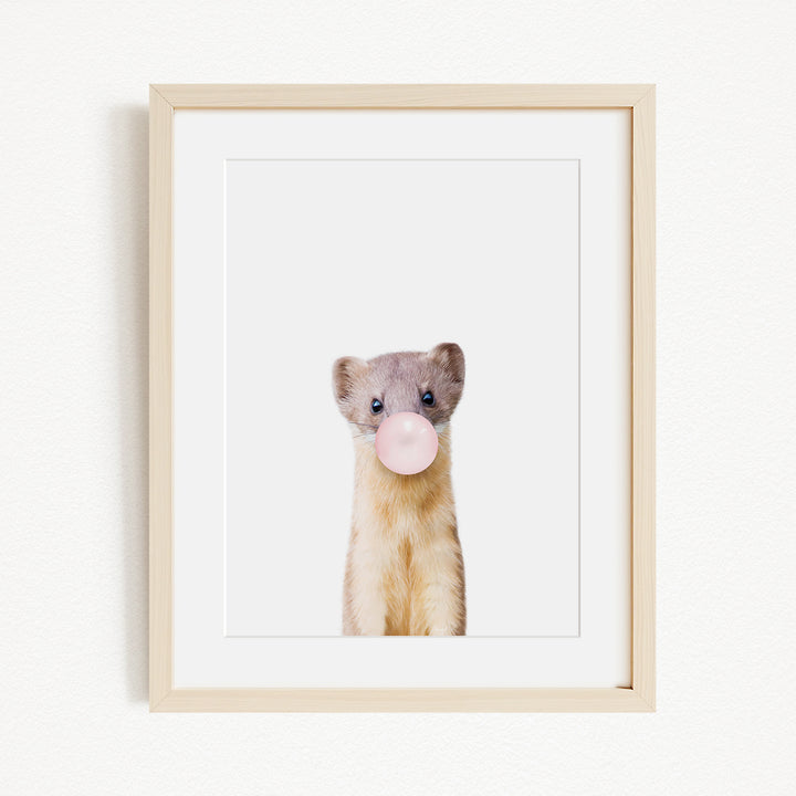 A small animal, possibly a rodent or a similar creature, is blowing a bubble with a pink bubble gum bubble wand.