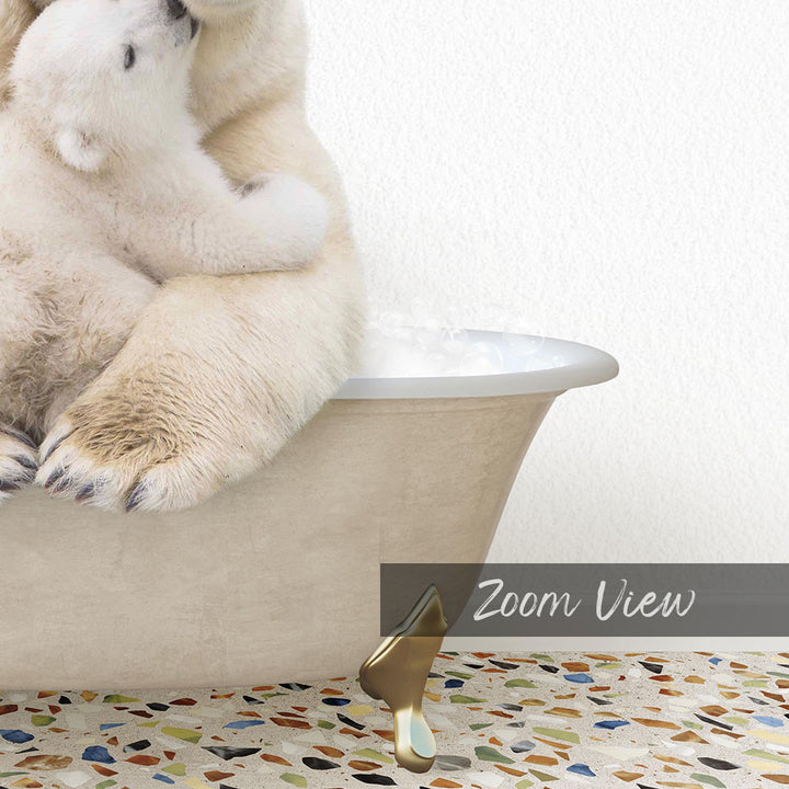 A polar bear sitting in a bathtub, with a baby polar bear nestled next to it.