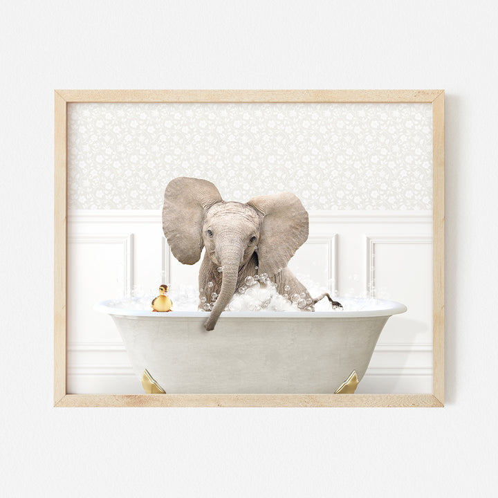 a picture of an elephant taking a bath