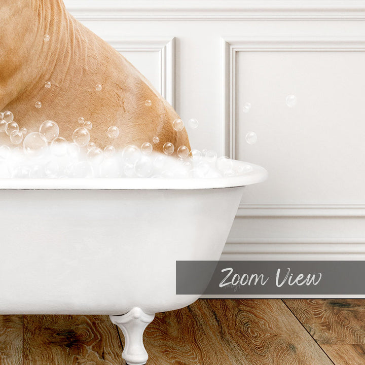 A person is taking a bath in a white bathtub filled with bubbles, with the text "Zoom View" displayed below the image.