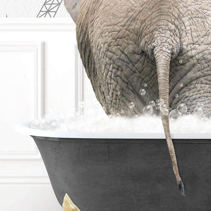 an elephant is taking a bath in a bathtub