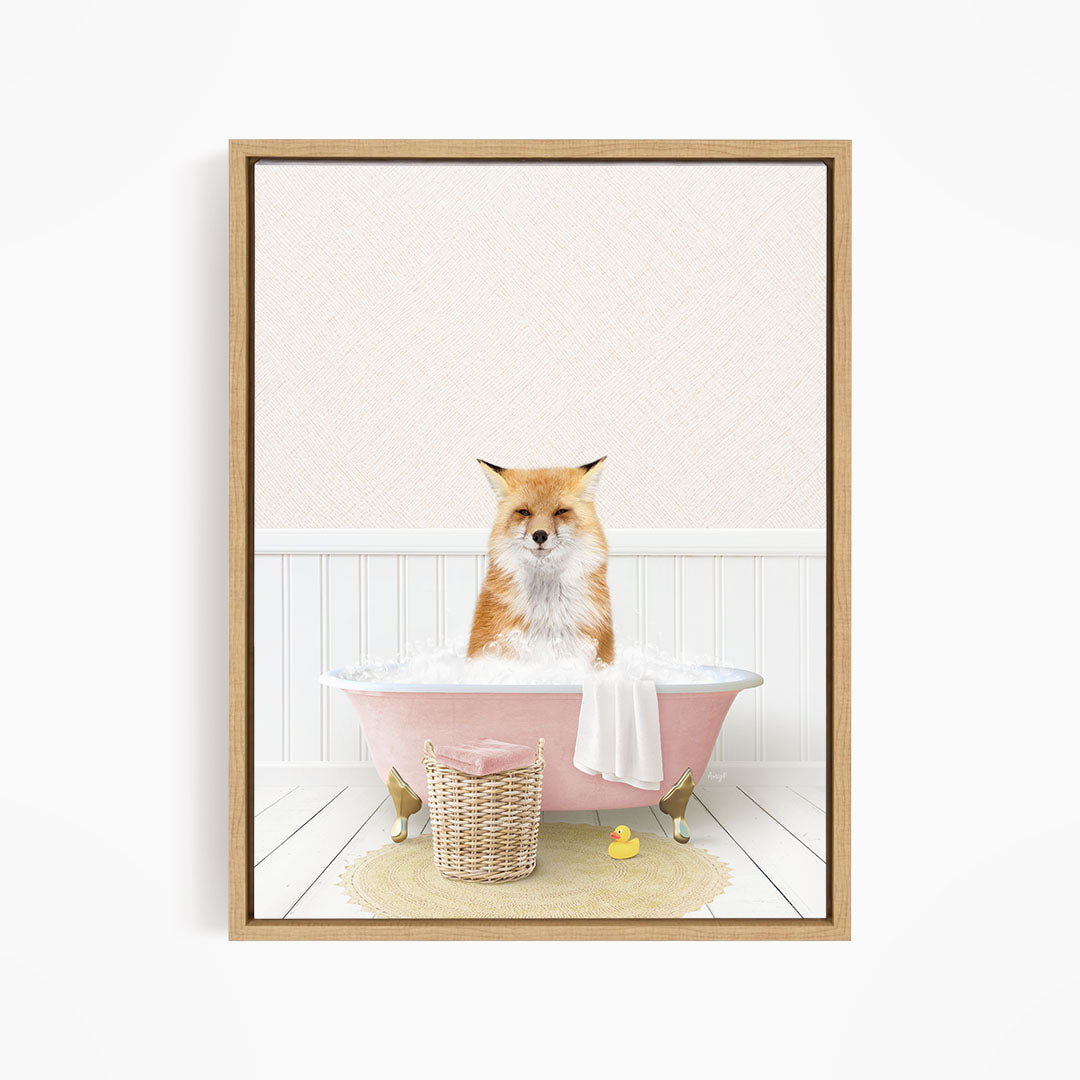 A fox is sitting in a pink bathtub filled with bubbles, surrounded by rubber ducks and a towel.