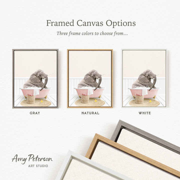 The image is a framed canvas option showcasing three different frame colors: gray, natural, and white. The canvas features a gray elephant sitting in a pink bathtub, with a basket nearby.